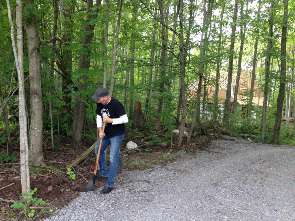 Digging the hole for fence post #1