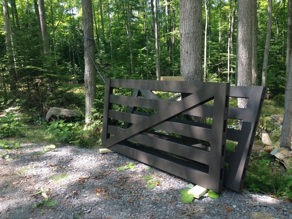 Our new gates, painted and ready to be installed